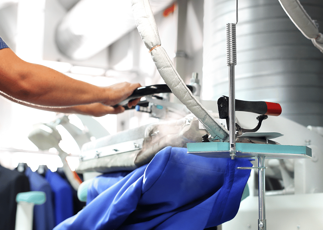 Garment presser works on a jacket