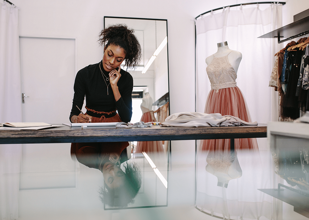 A tailor sketches alterations