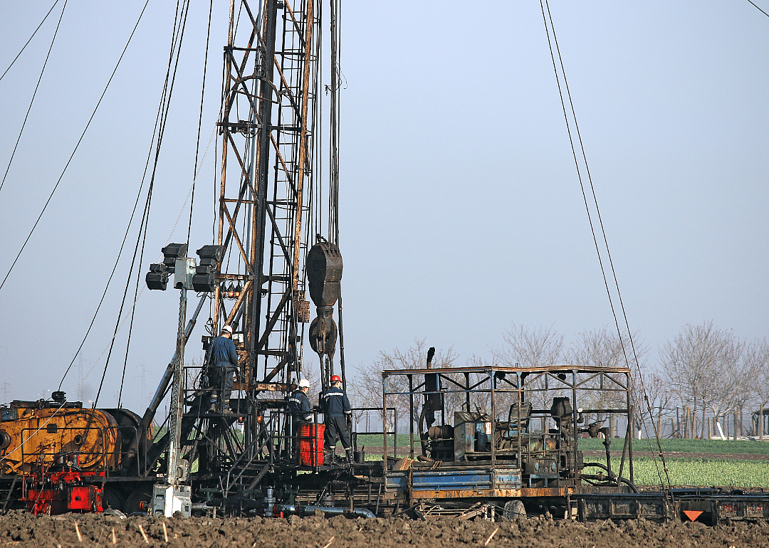 Derrick operators at an oil drill