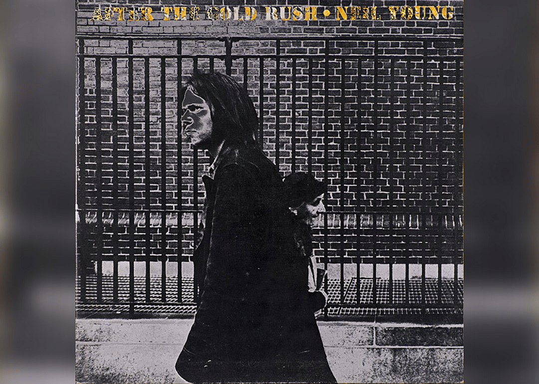 Black and white image of Neil Young Walking.