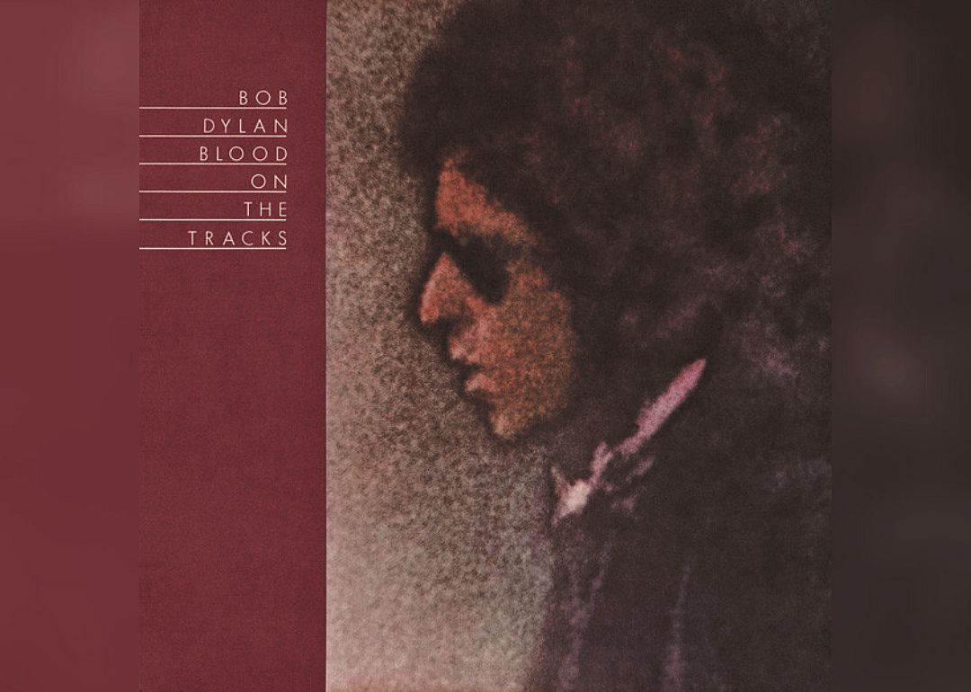 Blurry abstract profile view of Bob Dylan with shaggy hair.