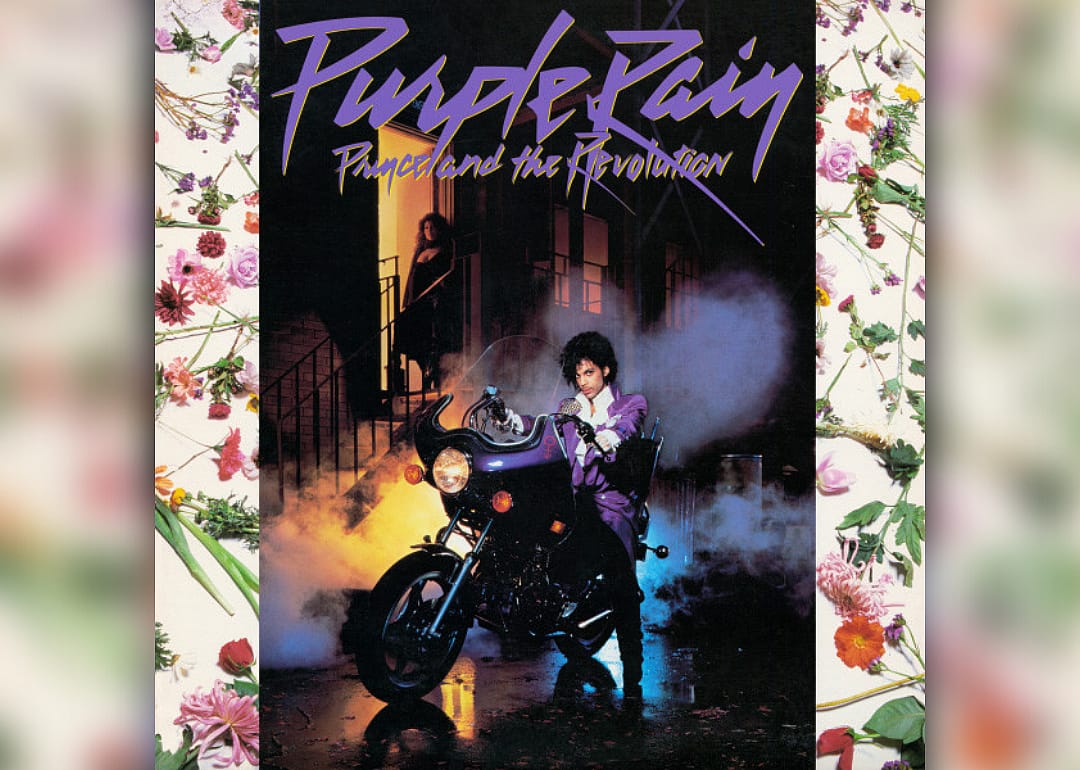 Prince, dressed in purple, on the famous motorcycle from the movie.
