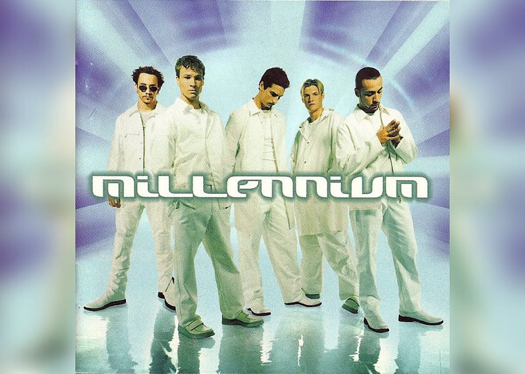 The Backstreet Boys in all white posing for a cover.
