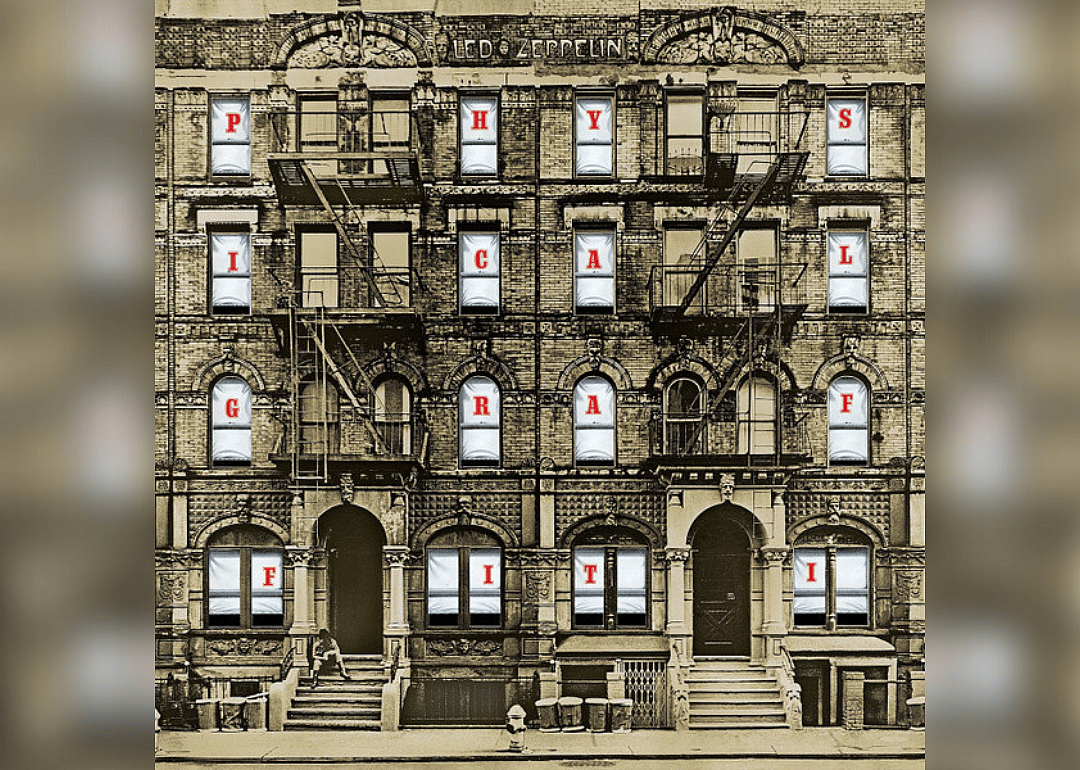A building with the album name spelled out as letters in each window.