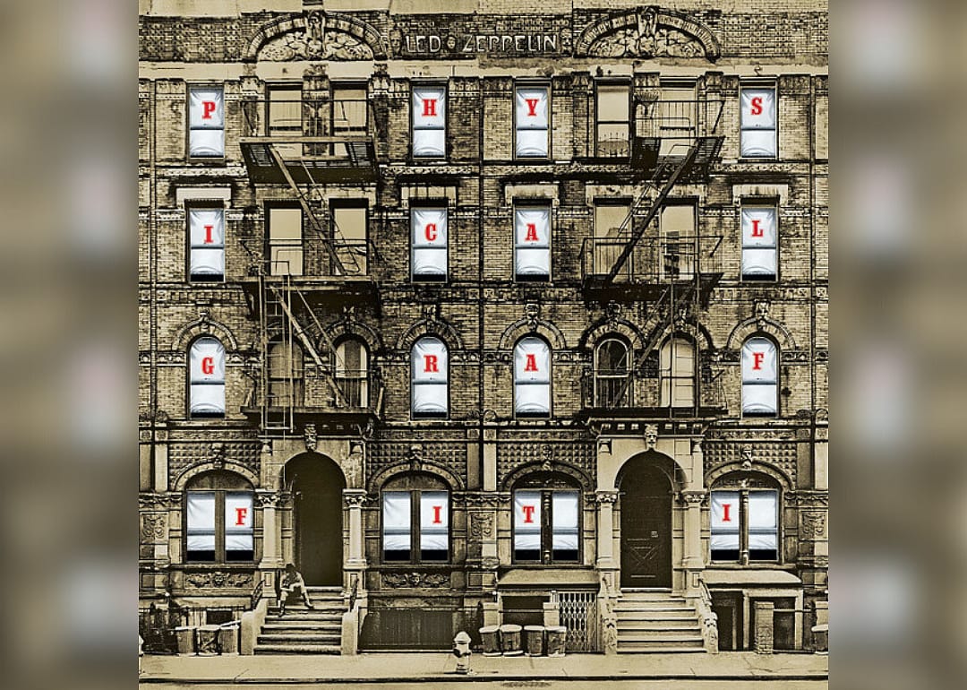 A building with the album name spelled out as letters in each window.