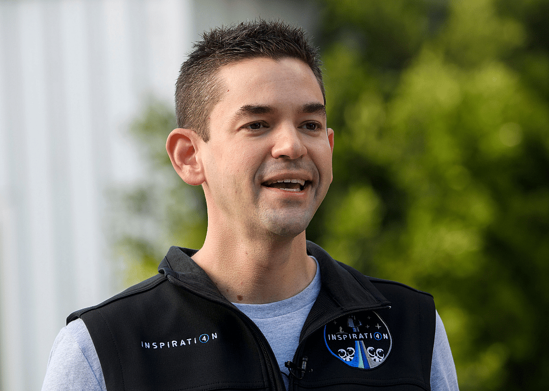 Jared Isaacman in a black vest.