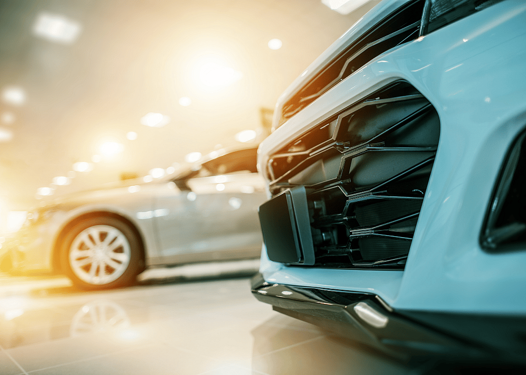Close-up of car grill in used cars showroom.