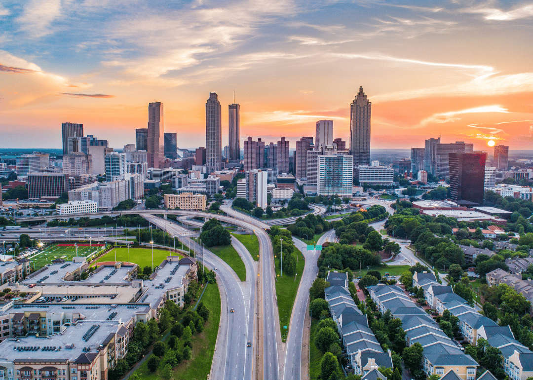 The downtown Atlanta skyline with homes and apartments in the foreground.
