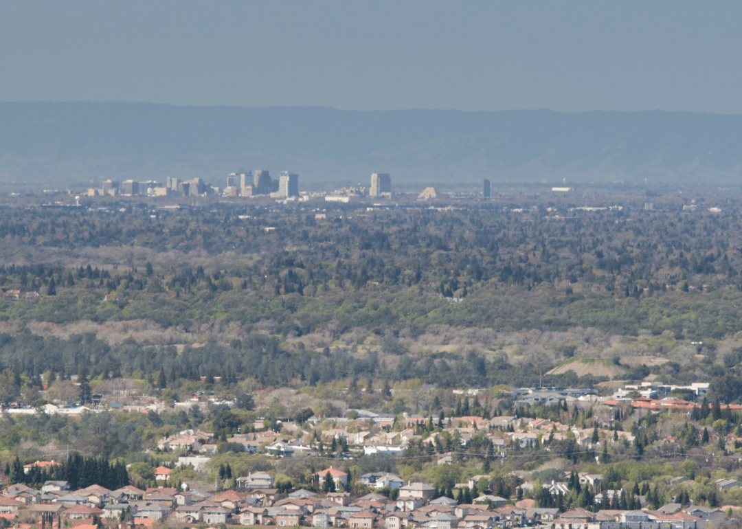 The Sacramento skyline with homes in the foreground.