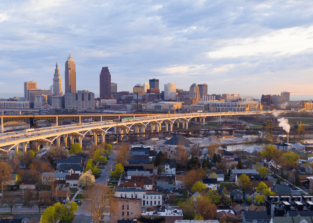 An aerial view of downtown Cleveland with homes in the foreground.