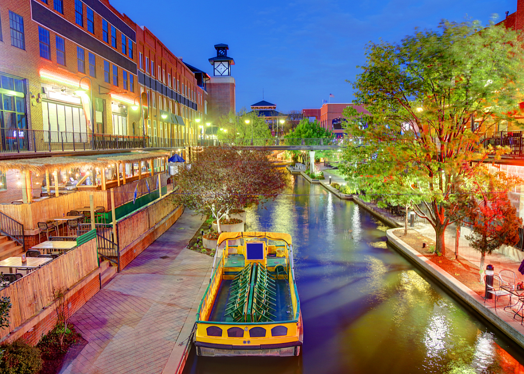 Restaurants on the river at twilight.