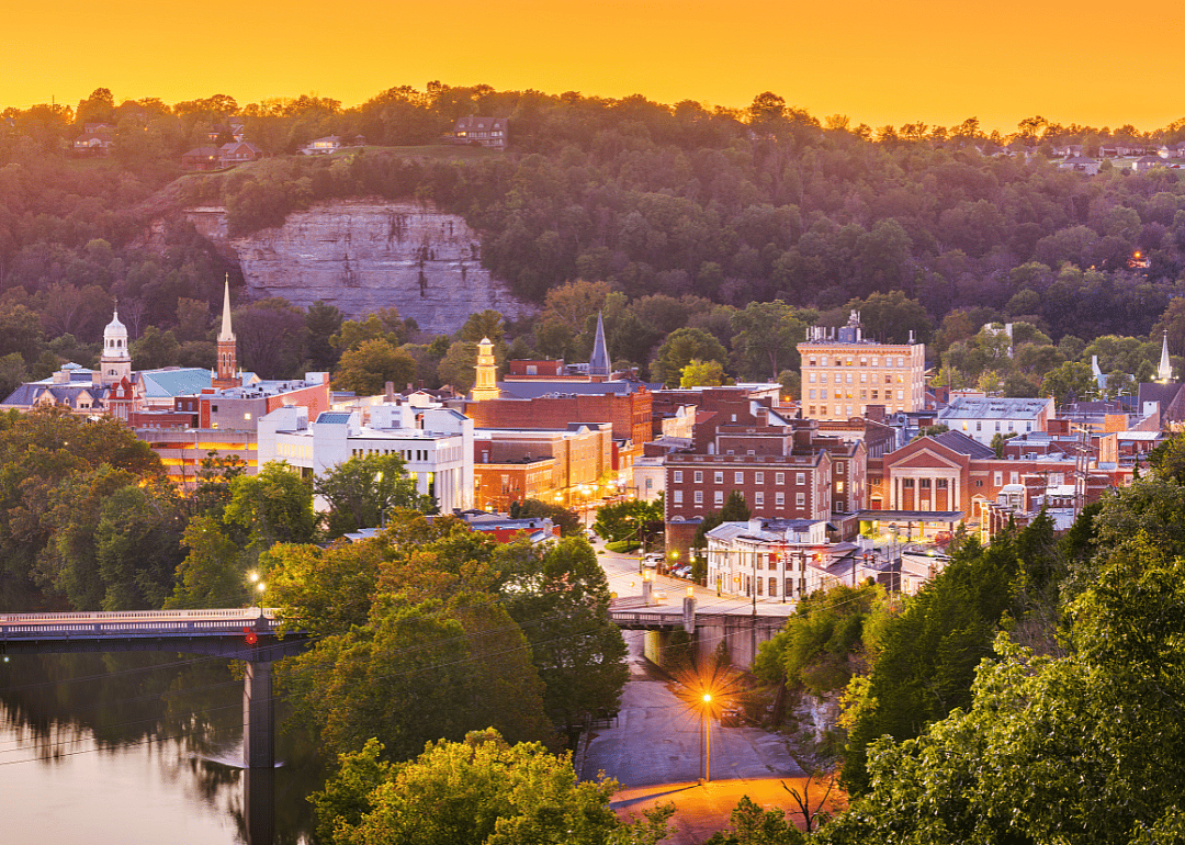 An aerial view of historic buildings in Frankfort at sunset.