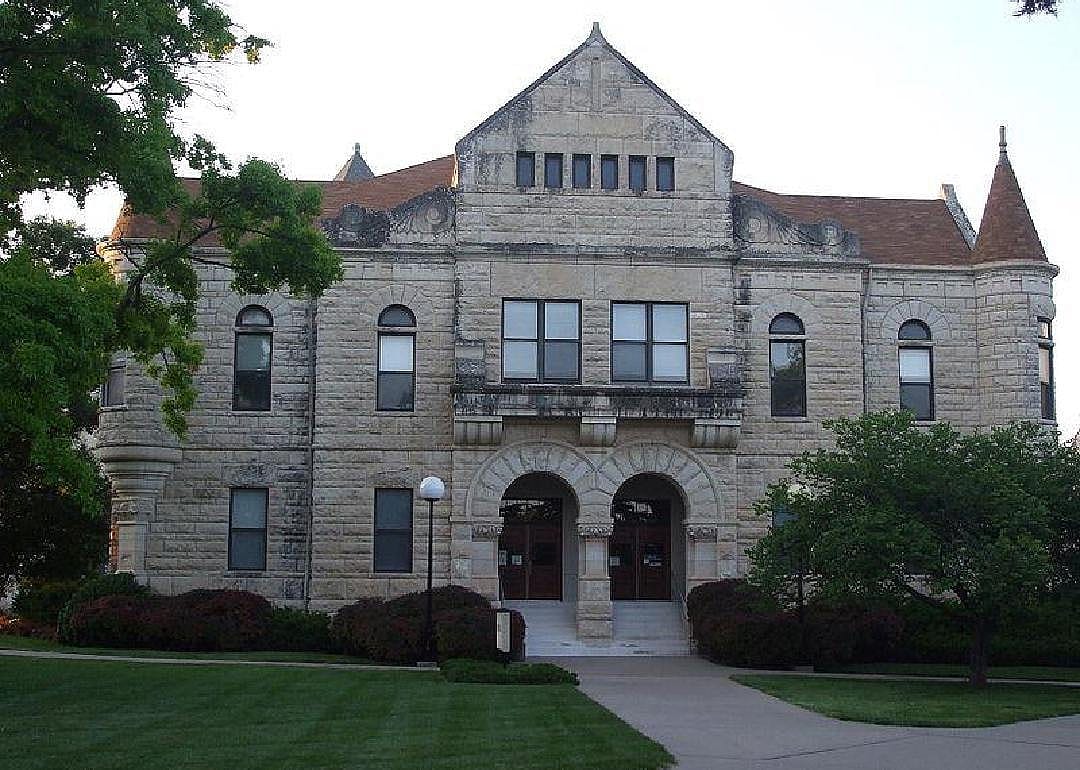 A historic white stone building.