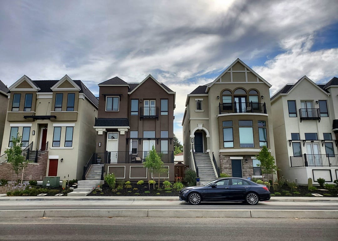 Three story row homes from the street.