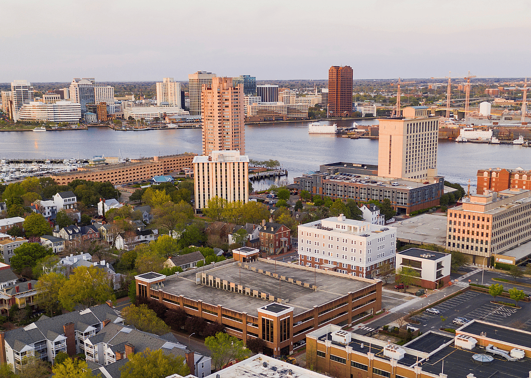 An aerial view of homes and buildings in Portsmouth on the river.