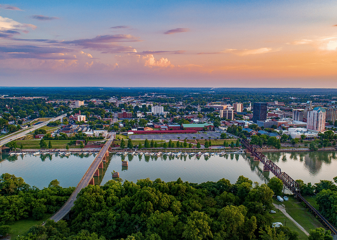 Aerial view of river, bridges, buildings and homes in Augusta, Georgia.