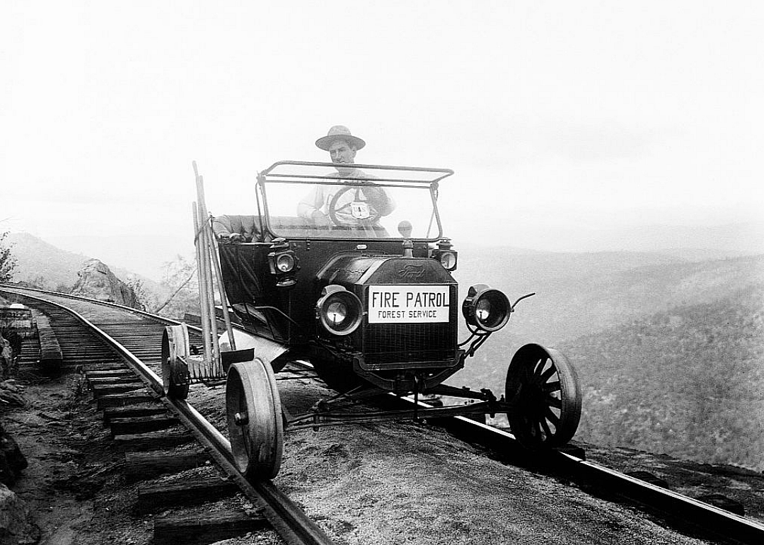 Ranger driving car on railroad