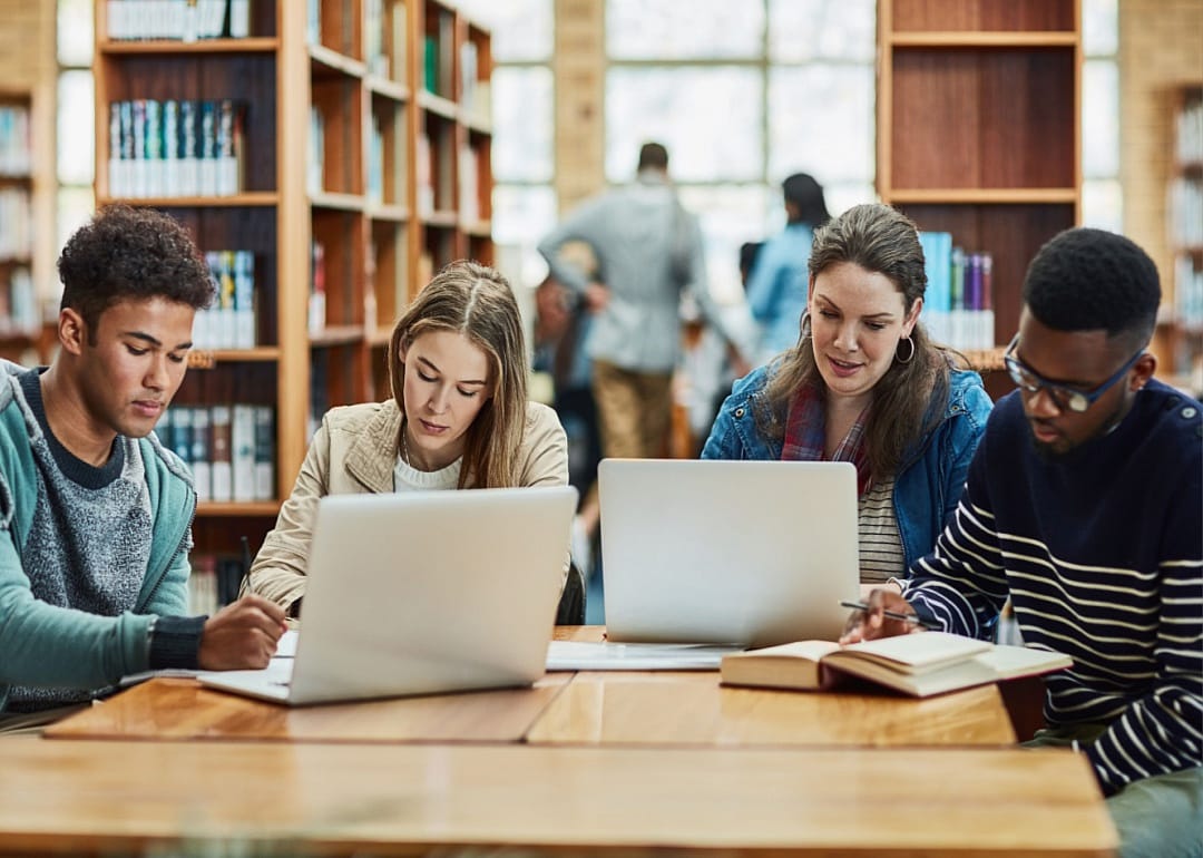 Students working in a library.