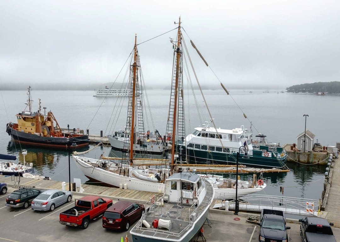 Waterfront scene with portside view of Arctic Schooner Bowdoin, a tall ship at Maine Maritime Academy.
