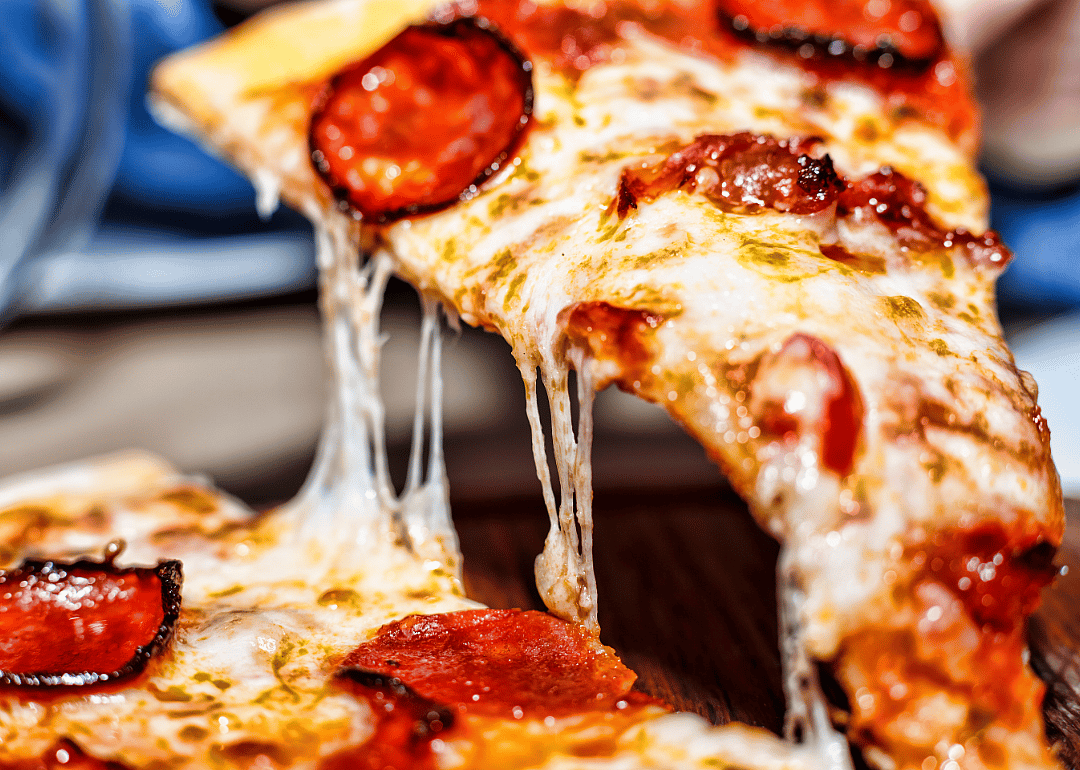 Crispy pepperoni pizza slice.
