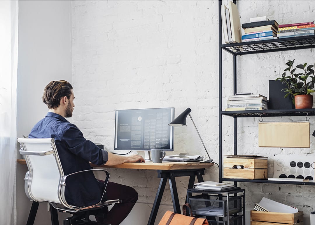 A man in his home office