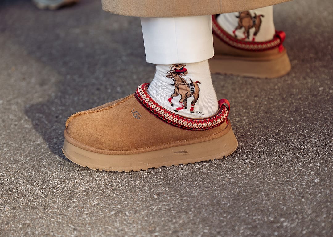A closeup of chestnut Ugg Tazz slippers during Copenhagen Fashion Week Autumn/Winter 2023 in Denmark.