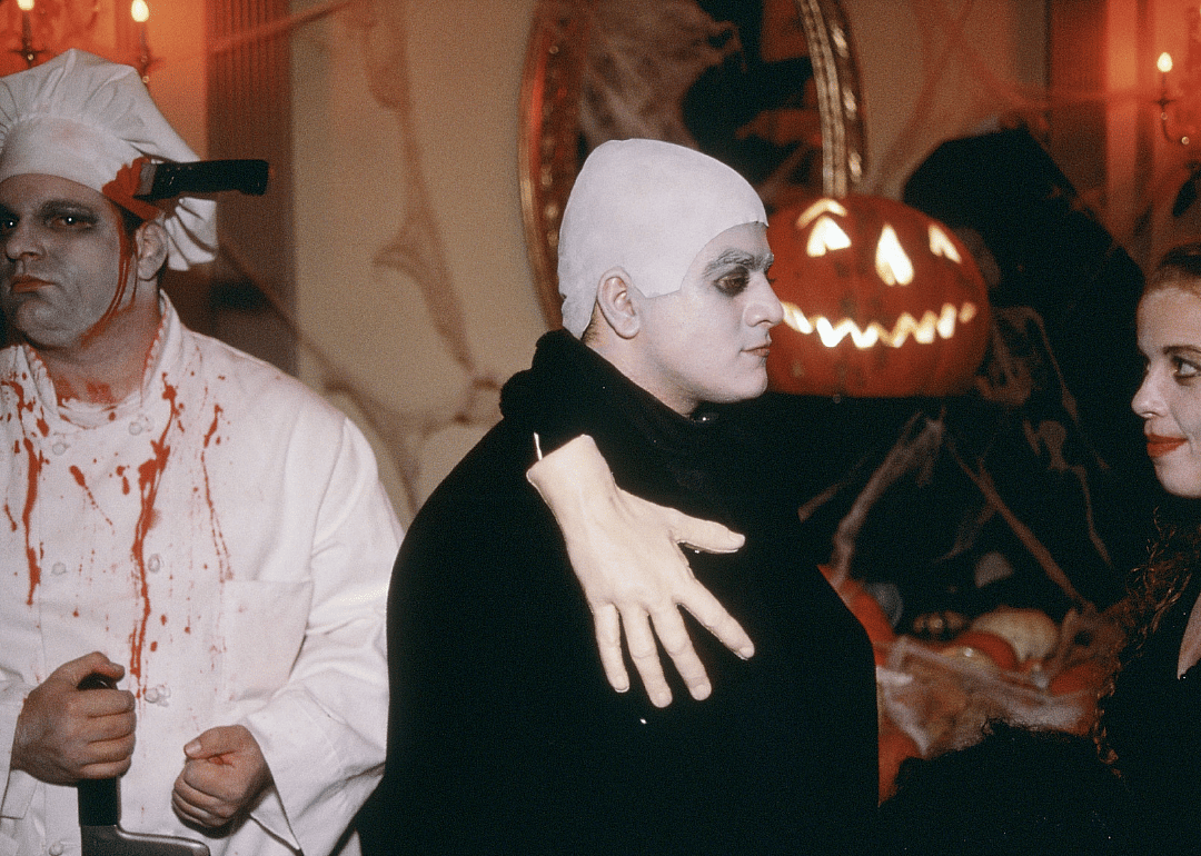 A chef and Uncle Fester with Thing