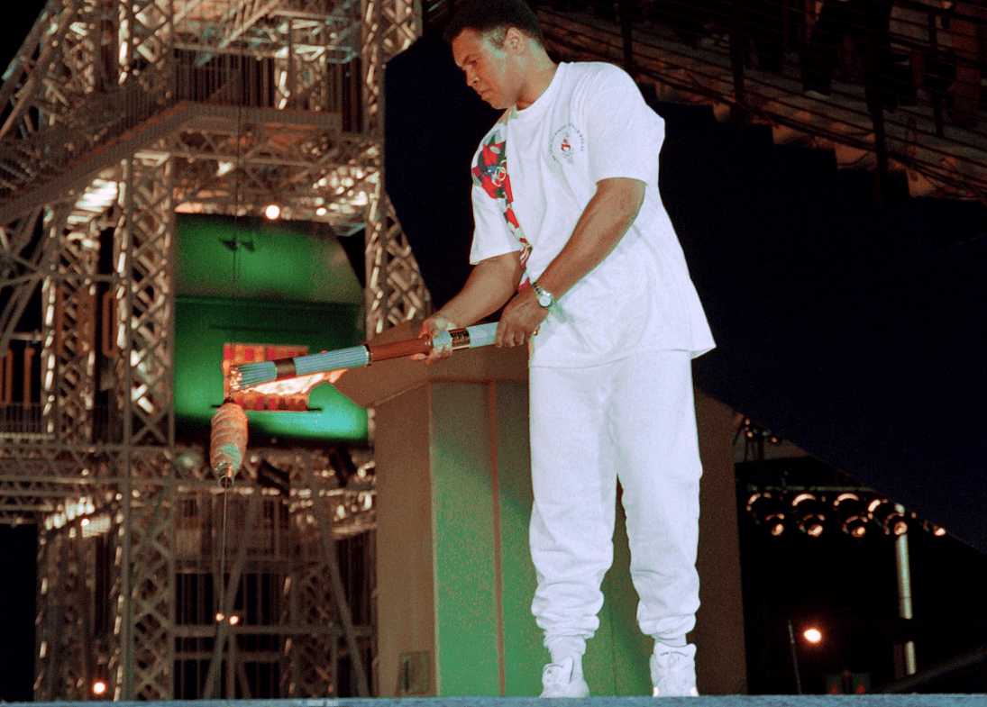 1996: THROUGH THE TEARS AND CHEERS, ALI'S FLAME LIGHTS UP THE NIGHT