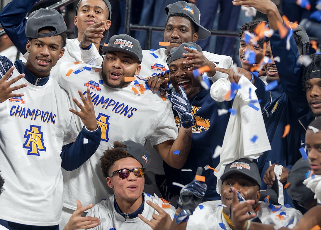 Football players celebrating.