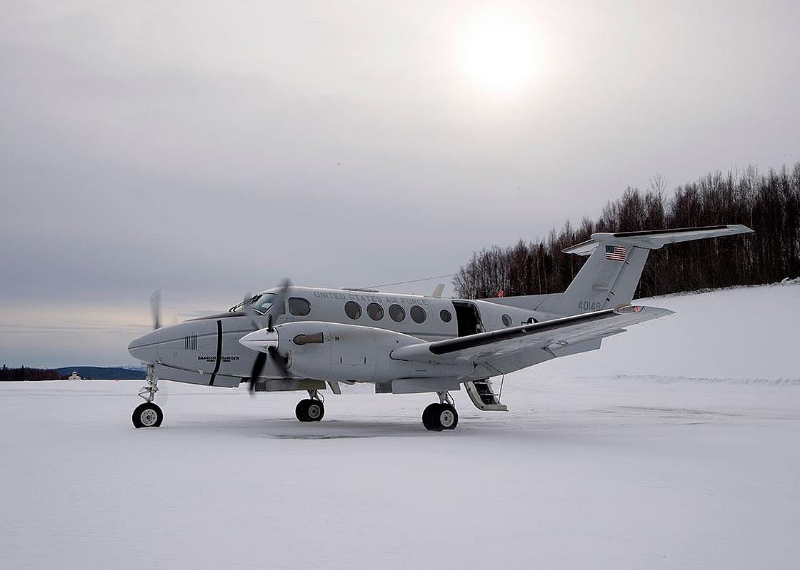 Pictured: A C-12F Huron assigned to the 517th Airlift Squadron at Joint Base Elmendorf-Richardson, Alaska, waits for passengers to arrive before taking off at Tatalina Air Force Station near McGrath, Alaska, Feb. 23, 2016
