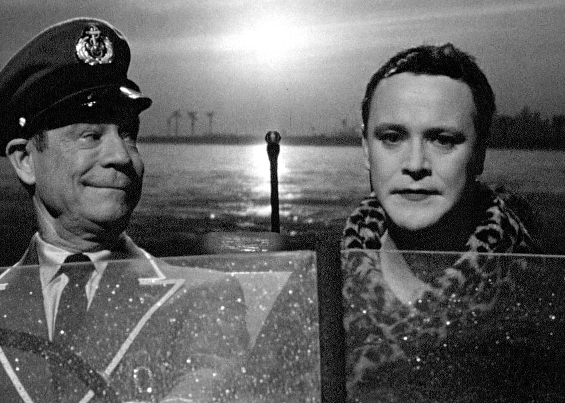 Jack Lemmon and Joe E. Brown on a boat.