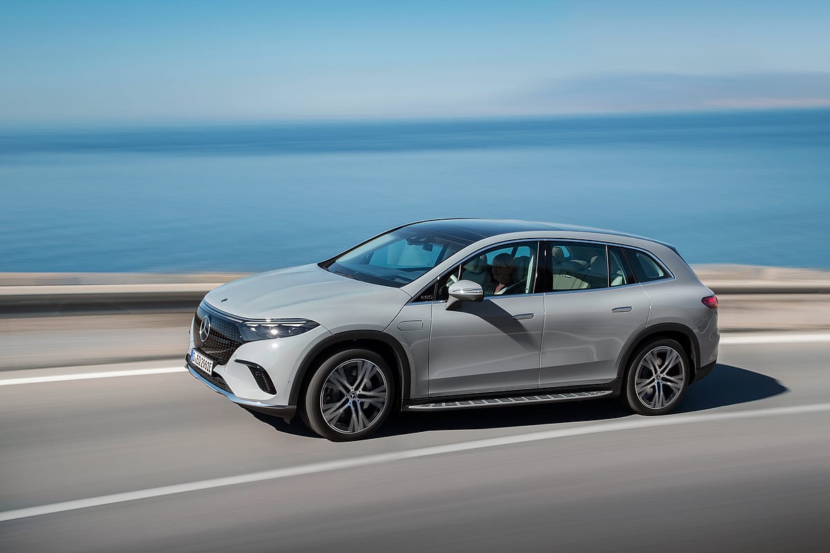 Mercedes-Benz EQS SUV on road next to ocean
