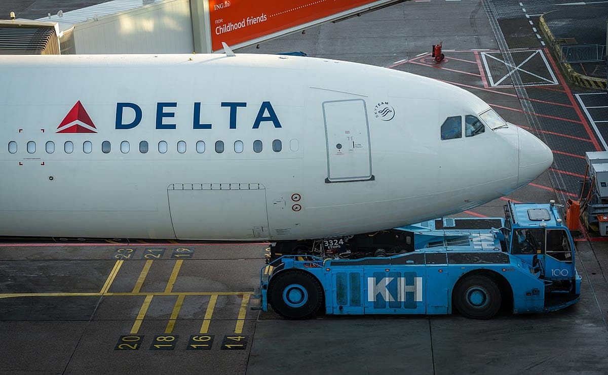 Delta Air Lines Airbus A330 Nose Gear Attached to Tow Tug at Amsterdam Schiphol Airport