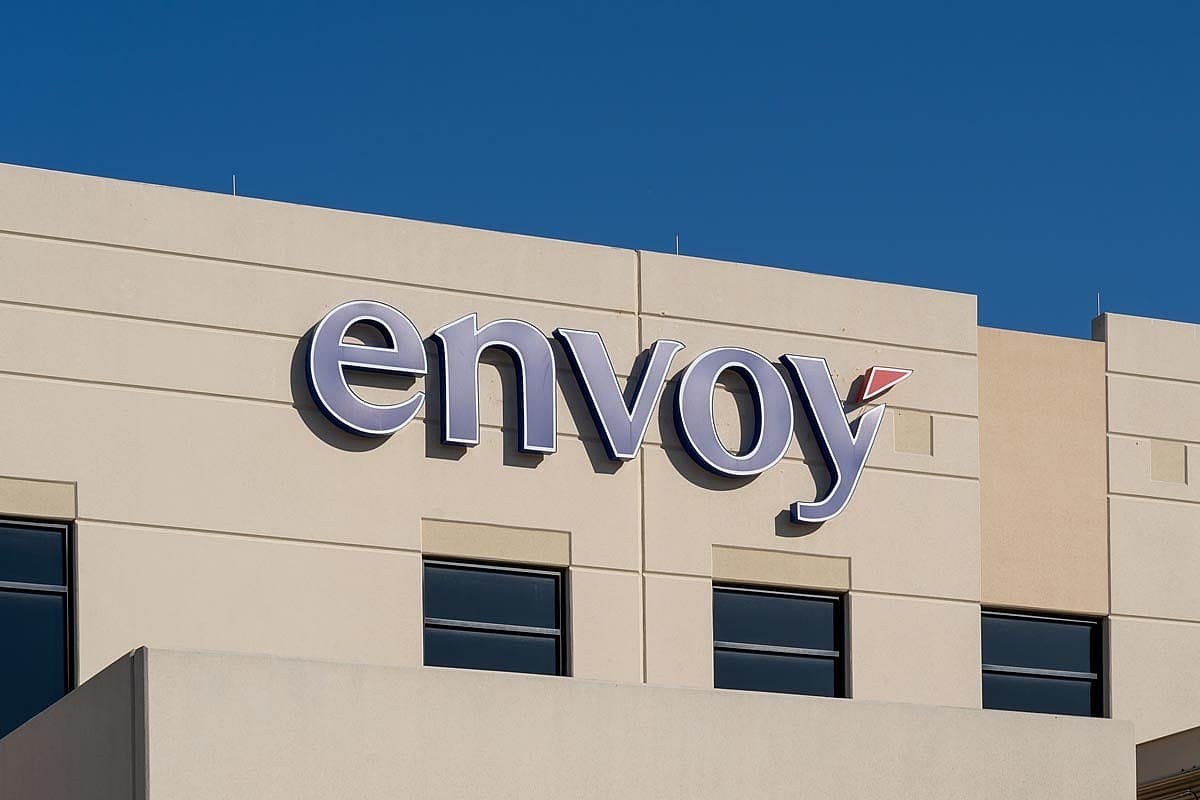 Closeup of Envoy sign on the building at its headquarters in Irving, Texas, USA. Envoy Air Inc. is an American regional airline.