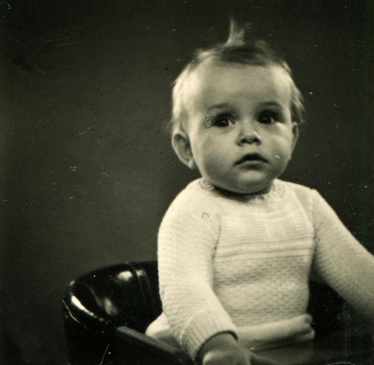 A vintage portrait photo of a baby in the 1940s
