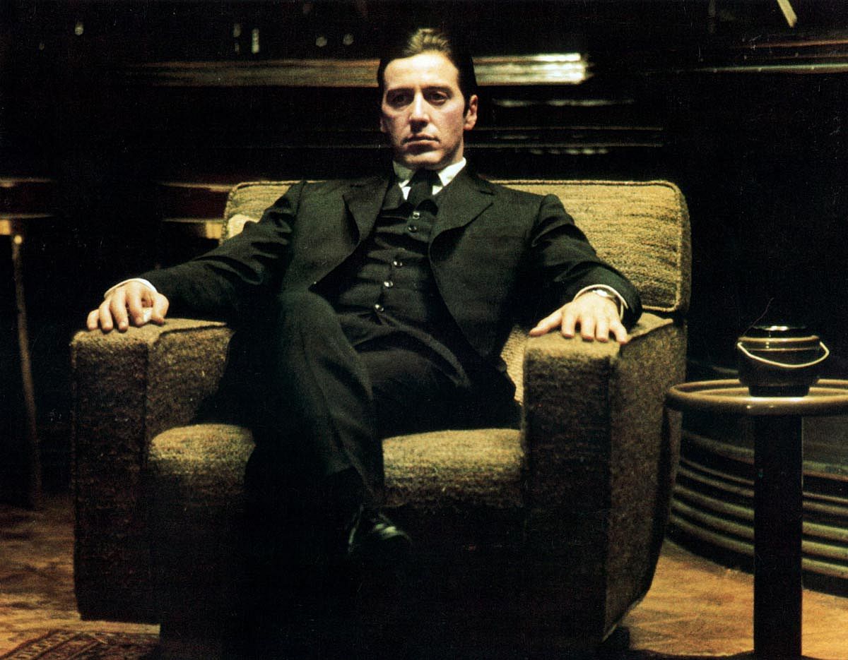 Al Pacino sits in a chair in a scene from the film 'The Godfather: Part II', 1974. 