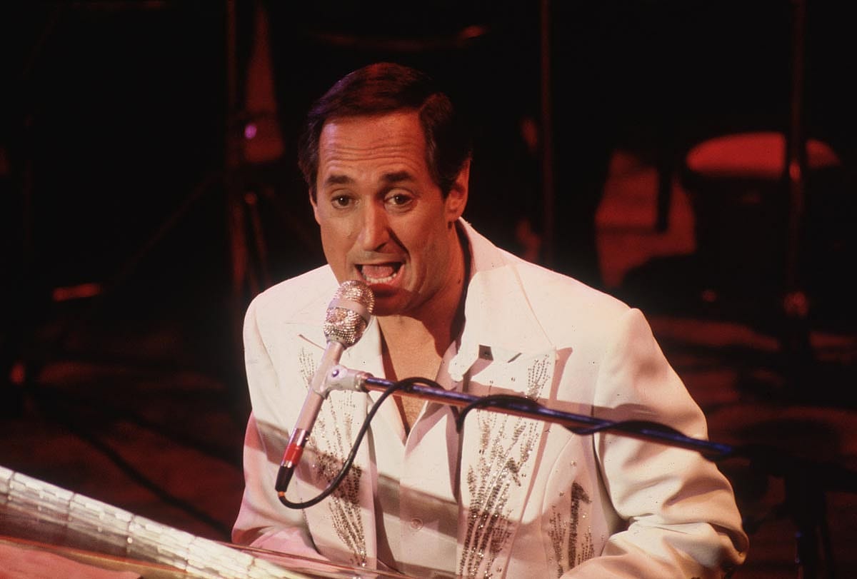 American songwriter, pianist and singer Neil Sedaka on stage at the Colston Hall in Bristol in 1975.