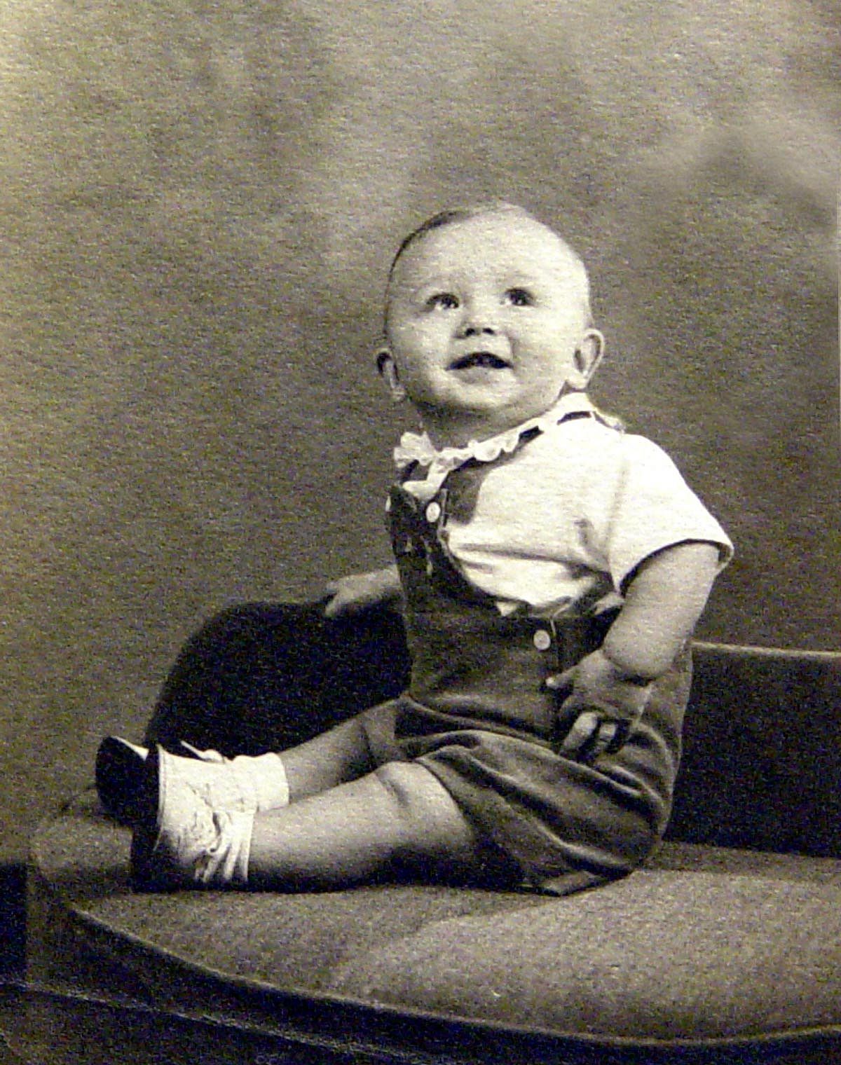 1940's smiling baby boy. Black and white vintage.