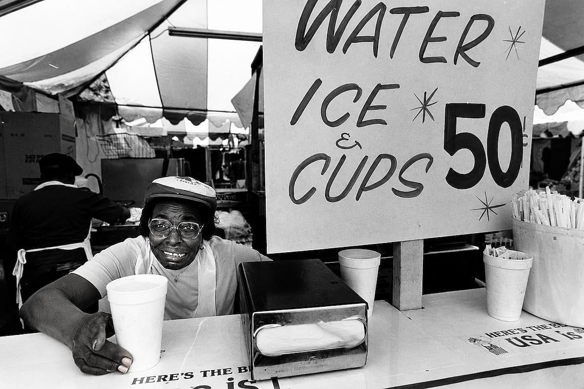 Woman selling cold water during the Olympics in LA, in 1984