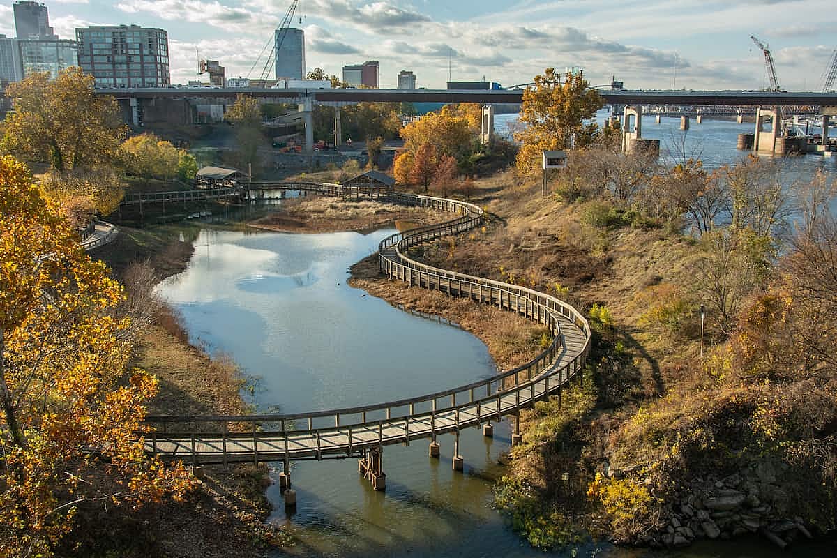 Little Rock downtown seen over the "Bill" Clark Wetlands located in the Clinton Presidential Park, Arkansas, USA
