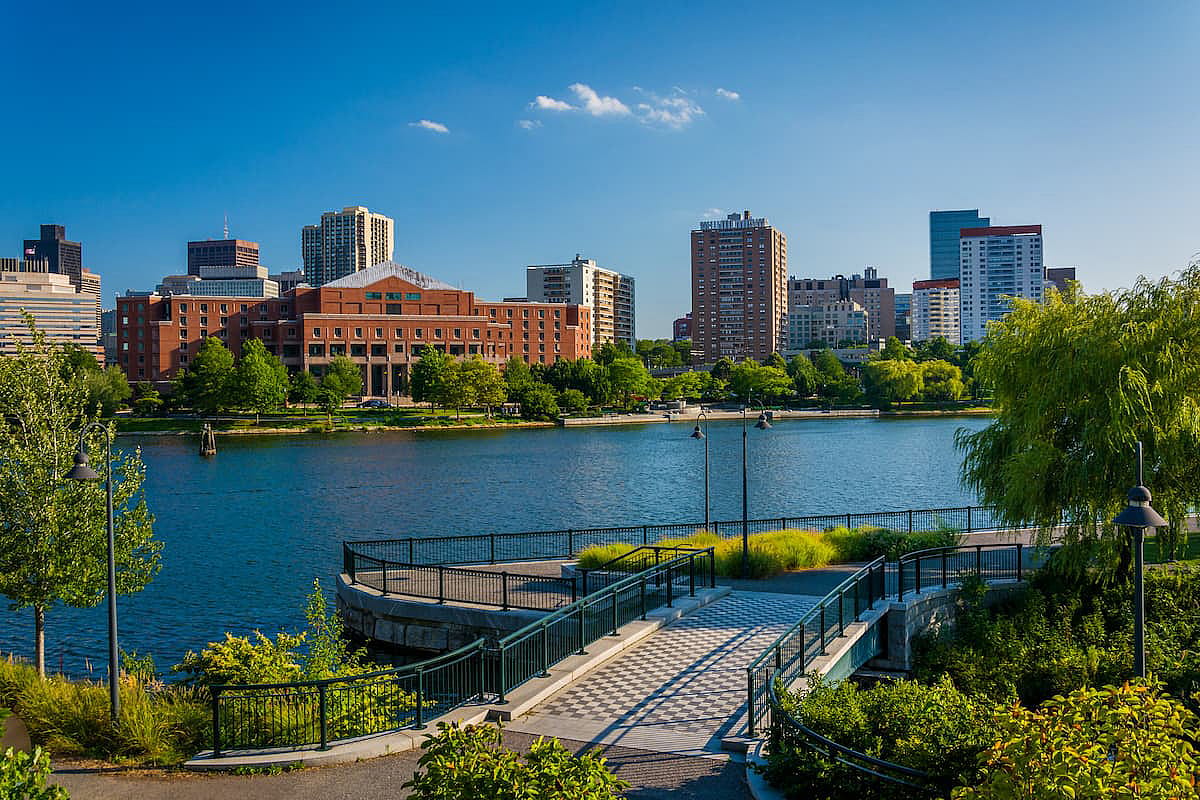 View of the Charles River and buildings in Boston, at North Point Park, in Cambridge, Massachusetts.