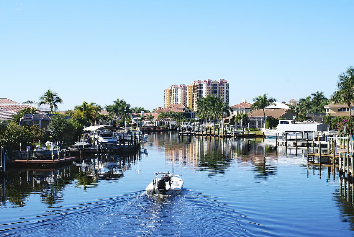 Boating along canal in Cape Coral Florida.