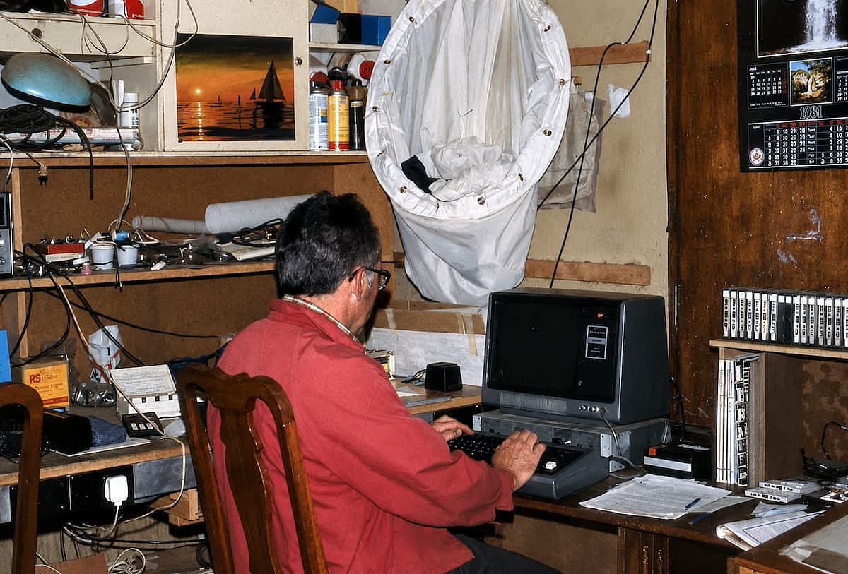 A man using his computer at this studio, in 1980.
