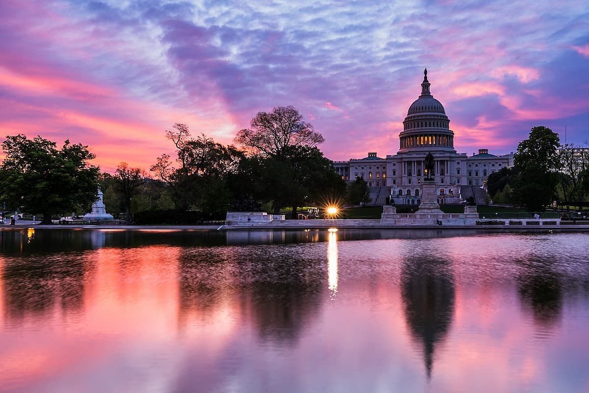 View of US Capitol Building with beautiful sky before sunrise, Washington DC