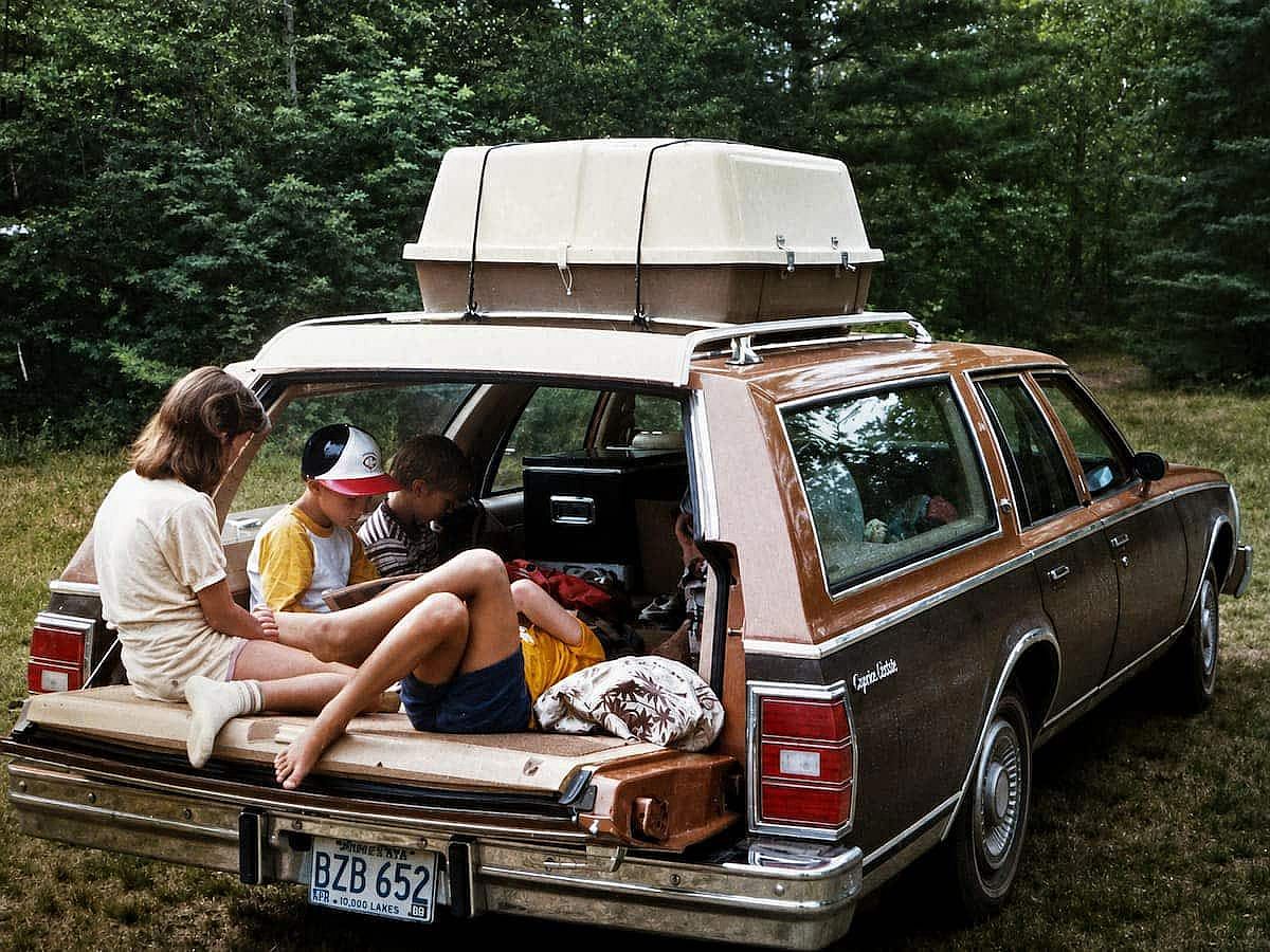 Kids hanging out in the back of the car while roadtriping.