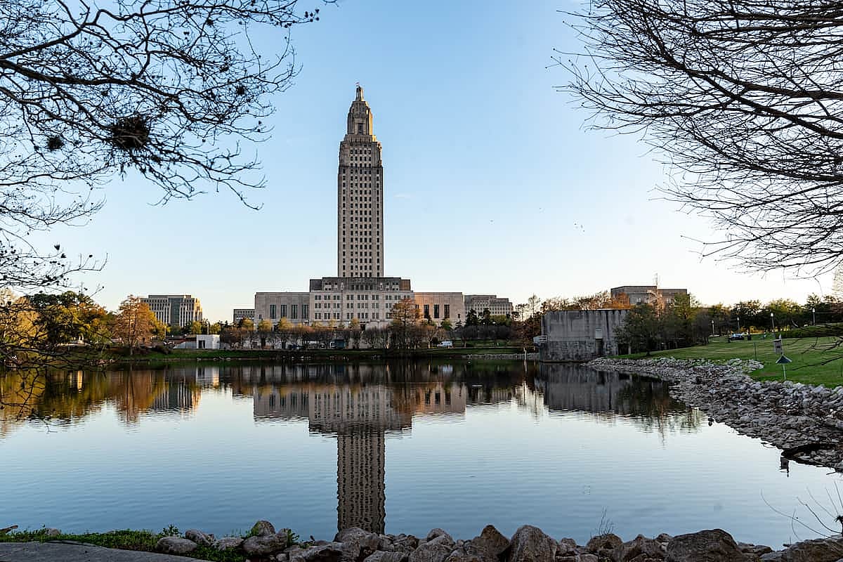 Louisiana State Capitol and Capitol Lake just before dusk