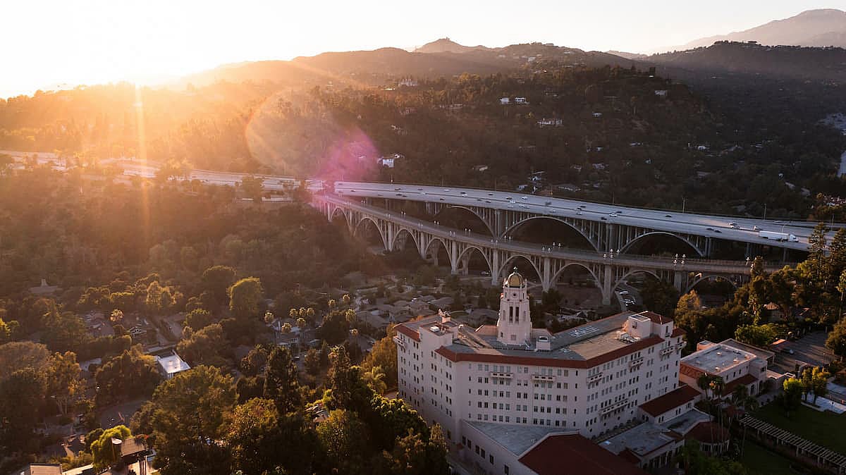 Sunset view of the historic skyline and bridges of downtown Pasadena, California, USA.