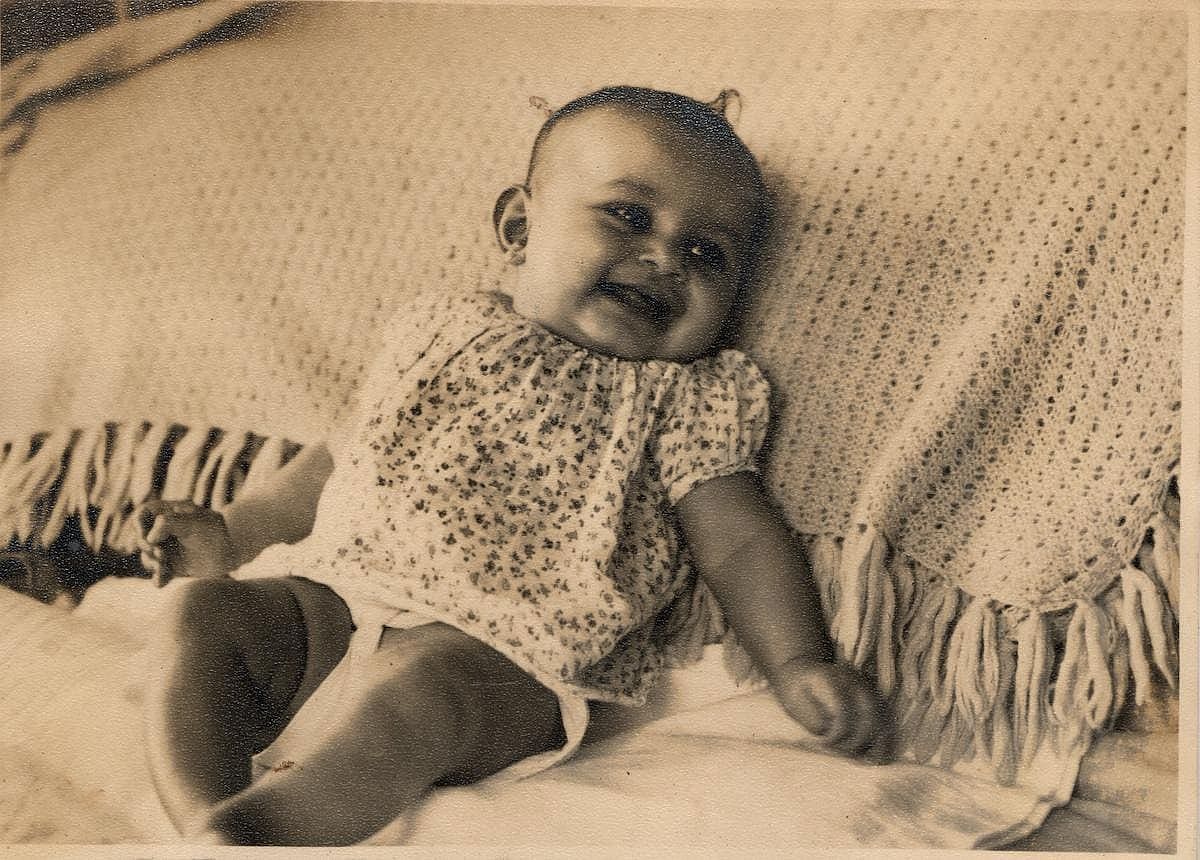 Happy baby boy during summer months.