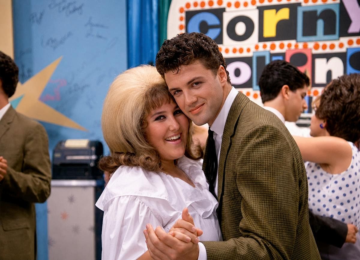 Ricki Lake and Michael Gerard dancing in a scene of Hairspray (1988)
