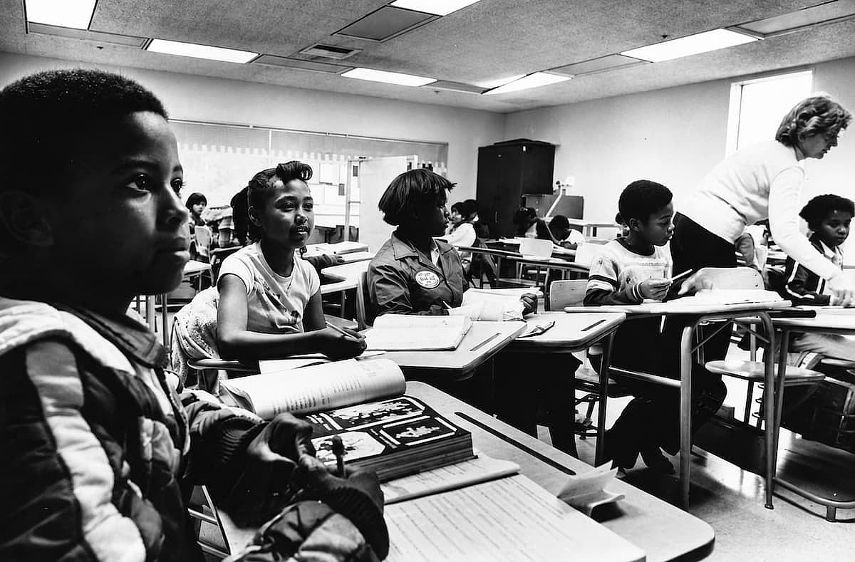 Kids attending a class in Middle School, 1982.